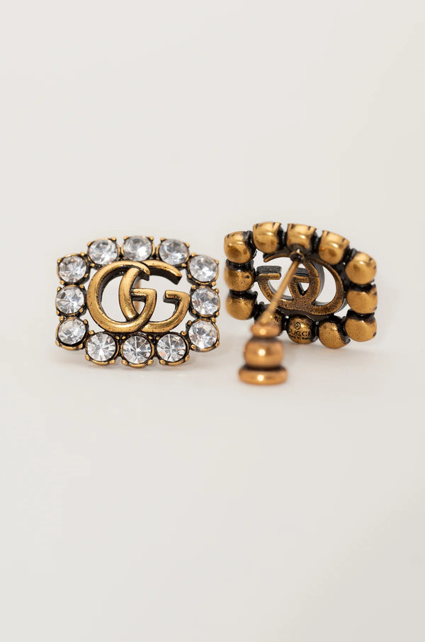 Clous d'oreilles en cristal symboliques