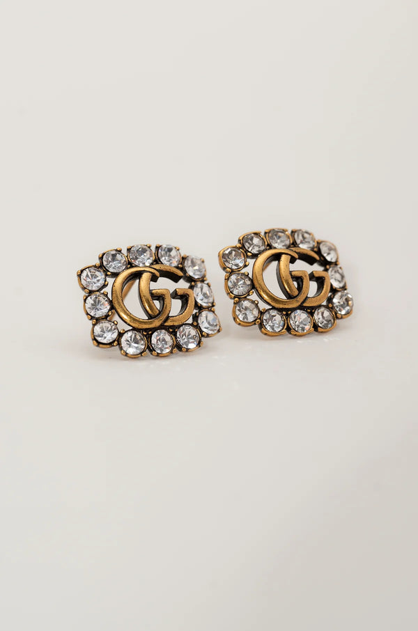Clous d'oreilles en cristal symboliques